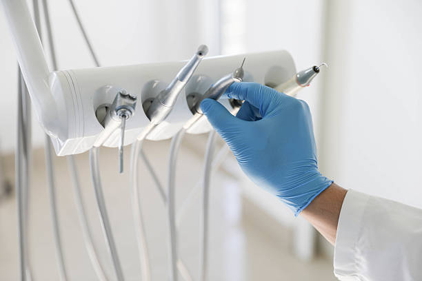 Professional Tooth Extraction technician working in Cary, IL